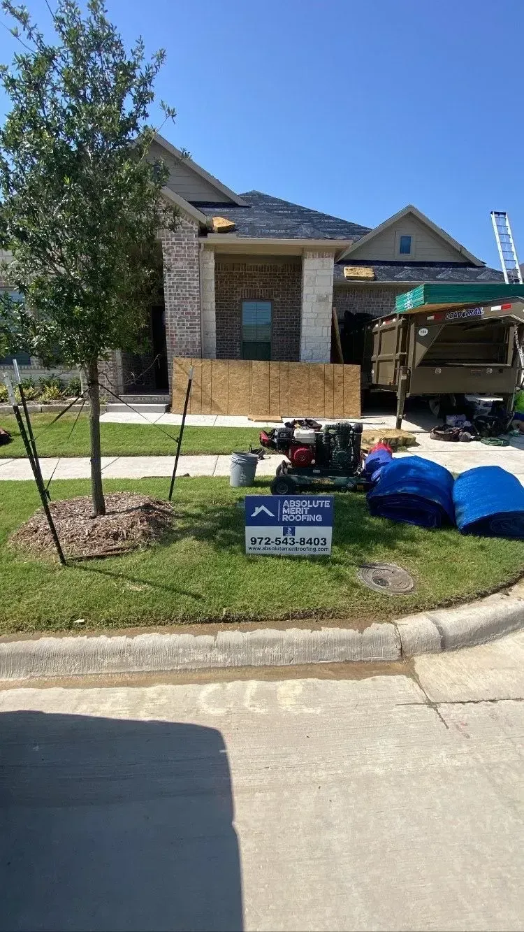 A house is being built in the middle of a residential neighborhood.