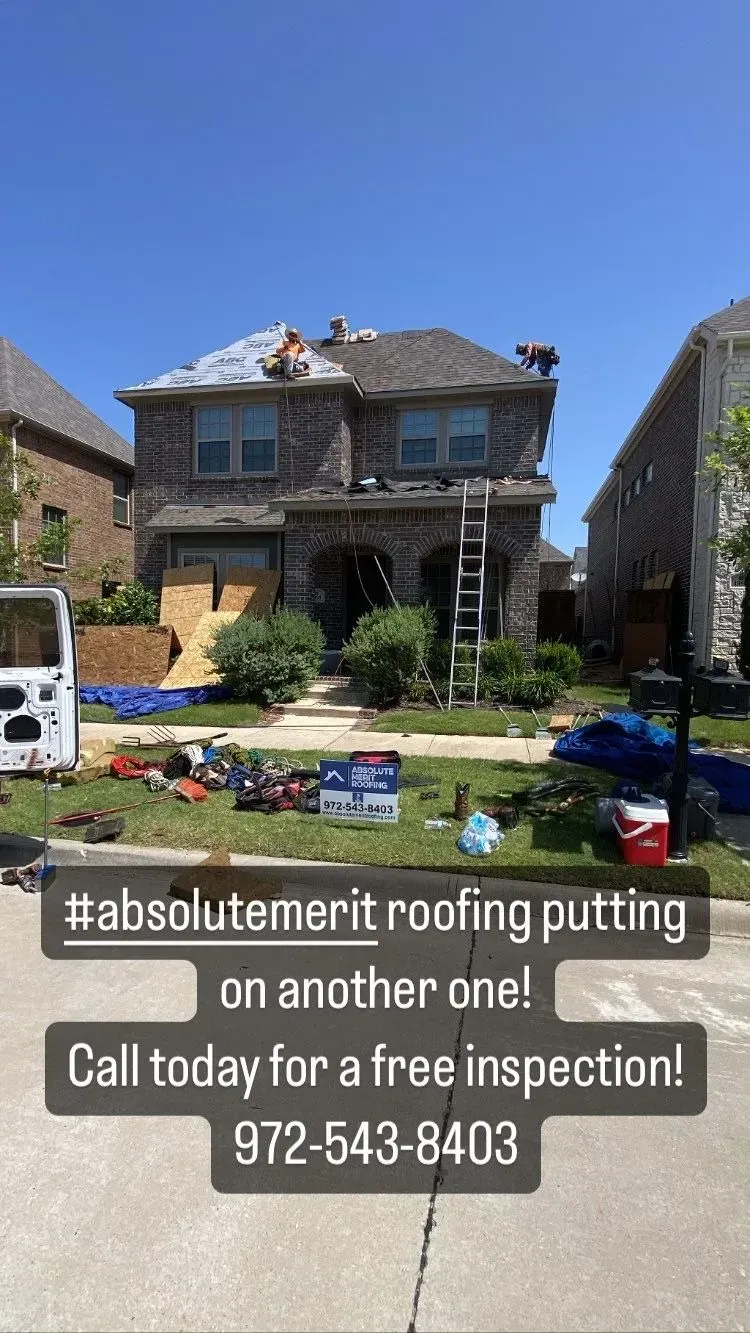 A house is being roofed by a roofing company.