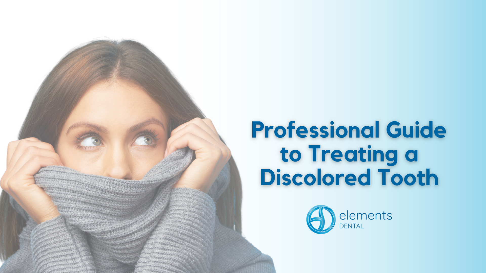 A woman is covering her face with a scarf.