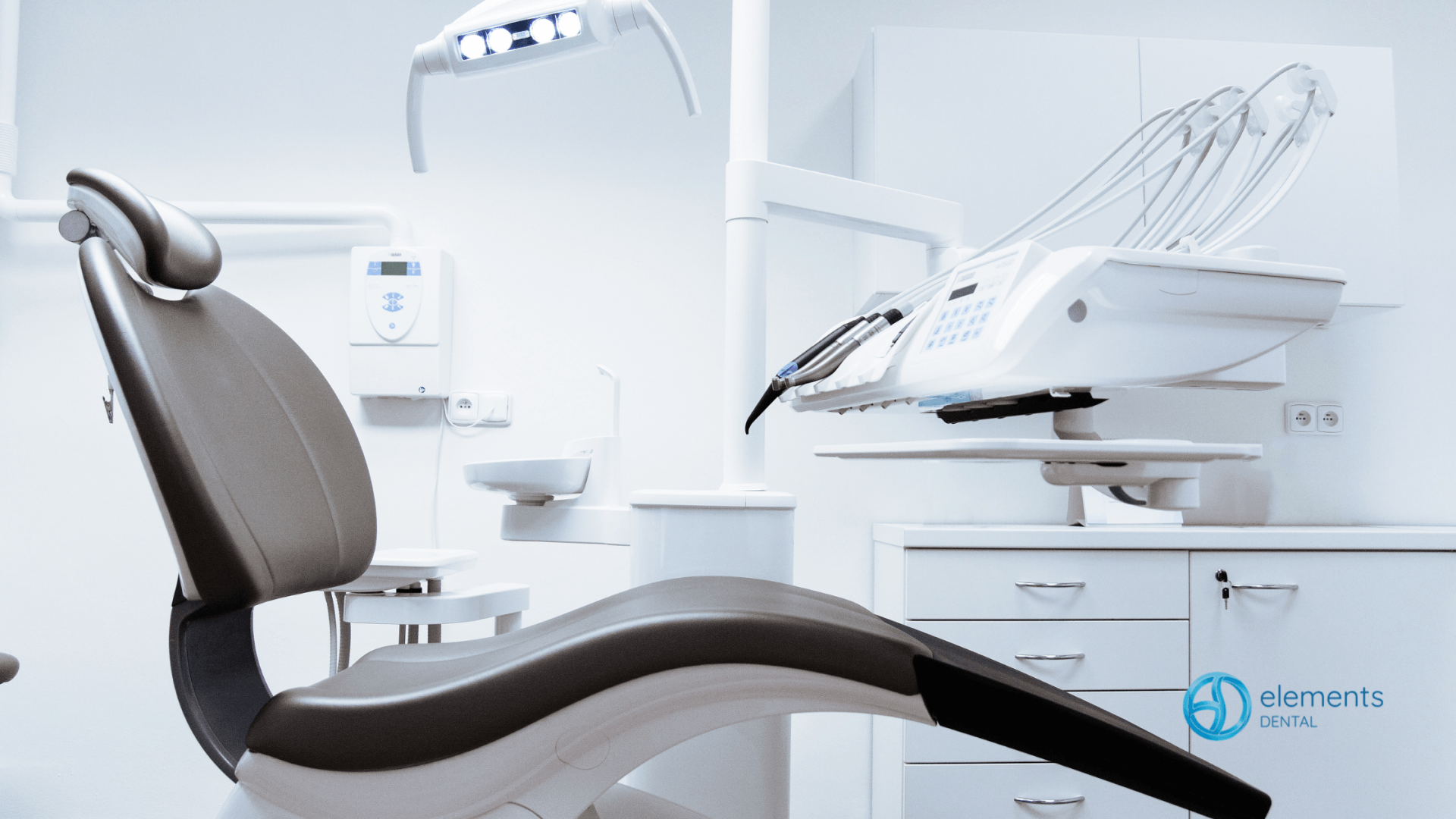 An empty dental chair in a dental office.