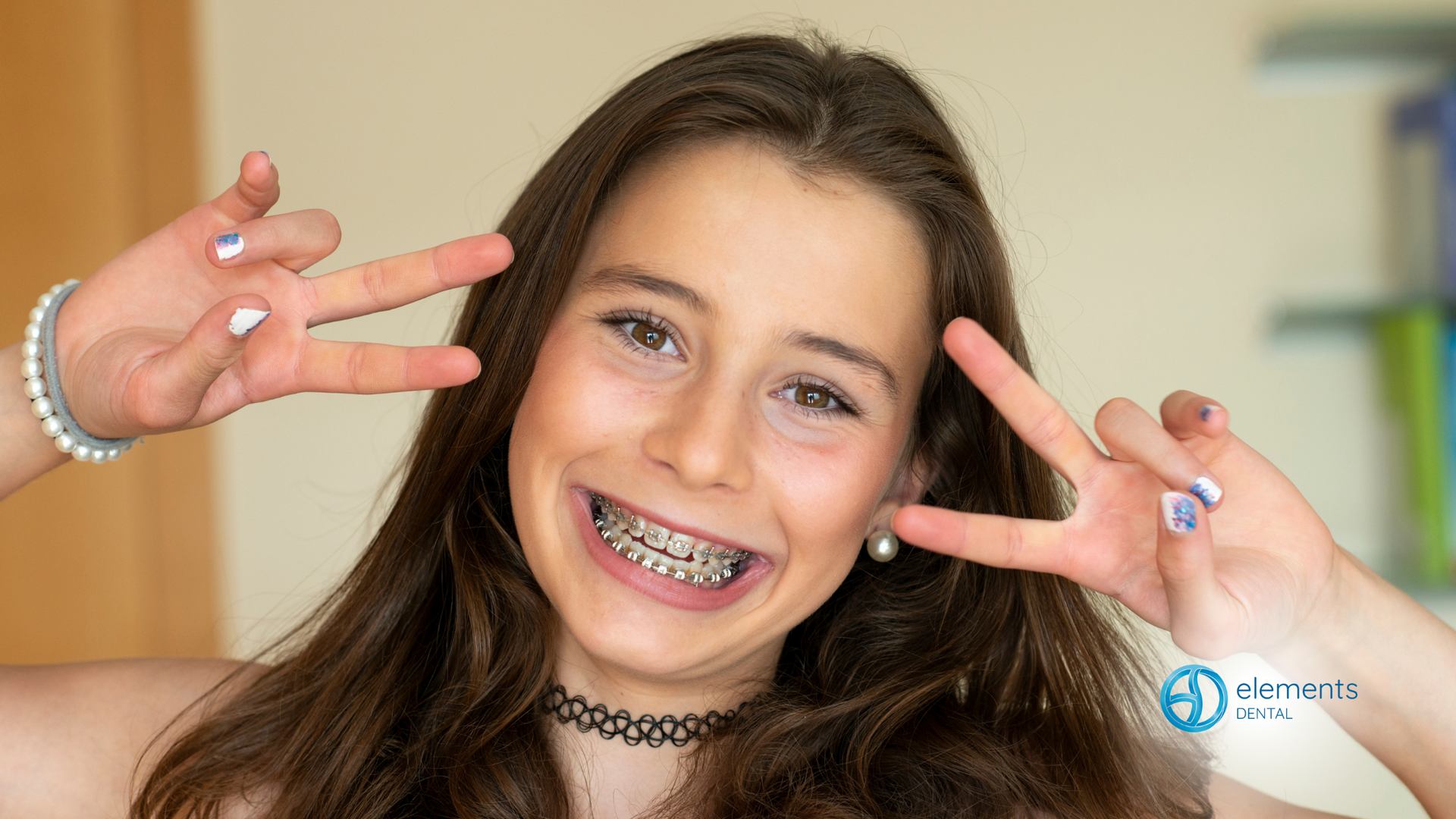 Young girl smiling with braces