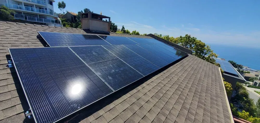 A roof with a lot of solar panels on it