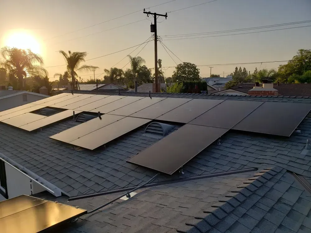 A roof with a lot of solar panels on it