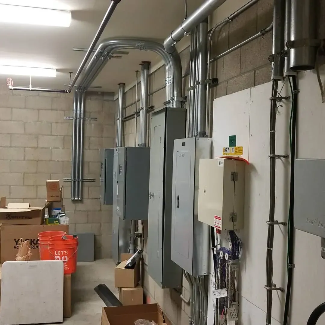 A warehouse filled with boxes and electrical boxes