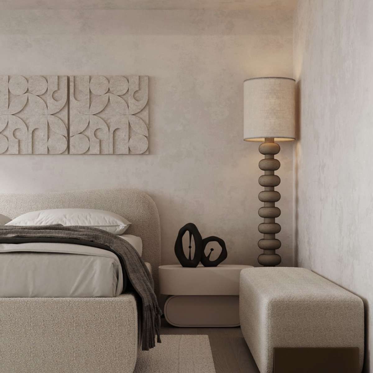 A bedroom with a bed , lamp and nightstand