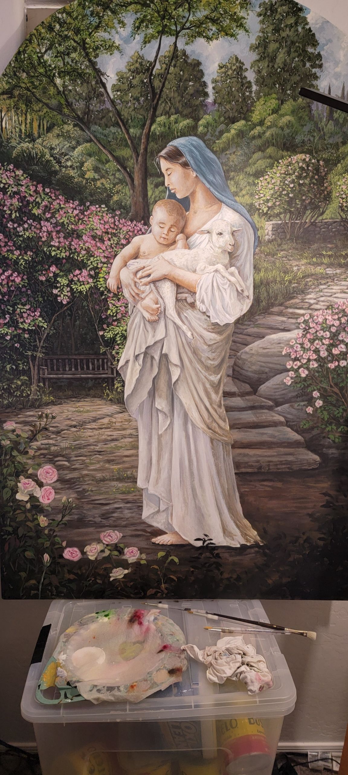 A painting of a woman holding a baby in a garden.
