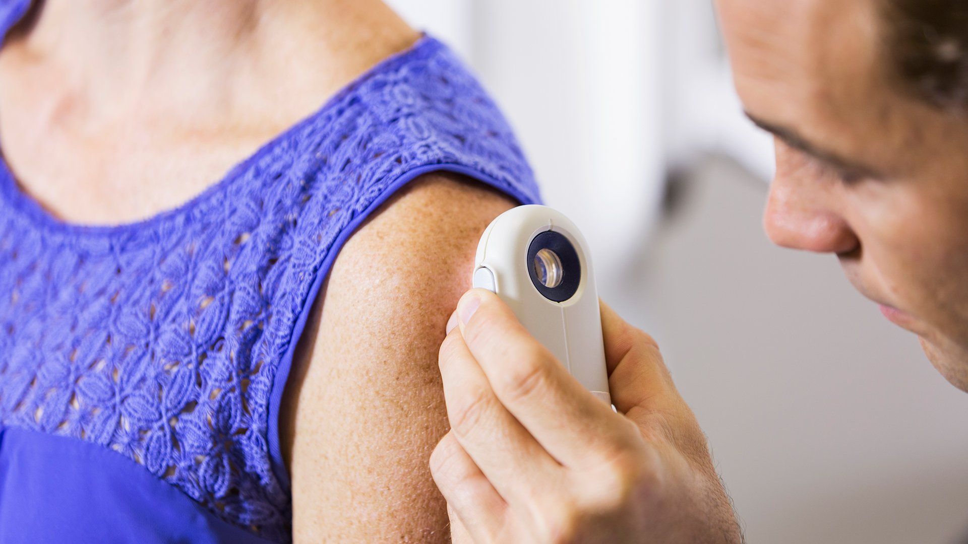 Checking Of Shoulder Skin On Woman — Redlands, CA — Aesthetic Skin And Laser