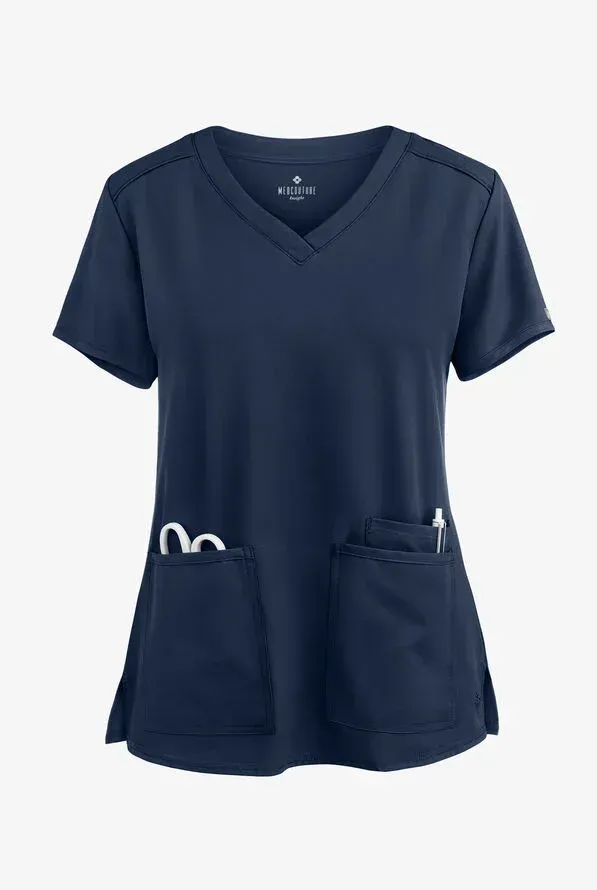 Navy blue V-neck scrub top with two front pockets, holding scissors and a pen.
