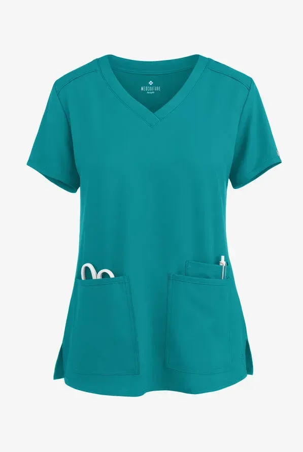 Teal scrub top with a V-neck, two front pockets, and side slits, containing medical tools.