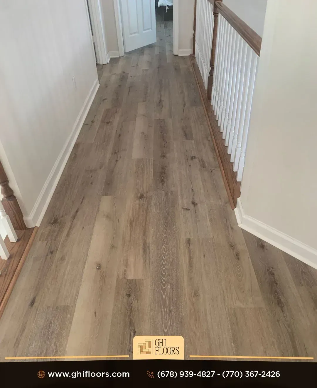 A hallway with hardwood floors and stairs in a house.