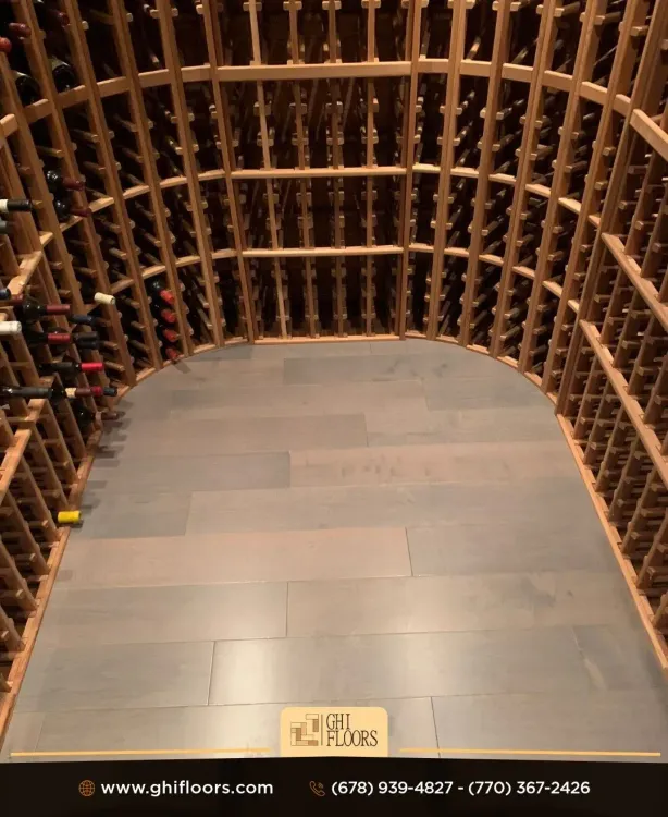 A large wine cellar filled with lots of wine bottles.