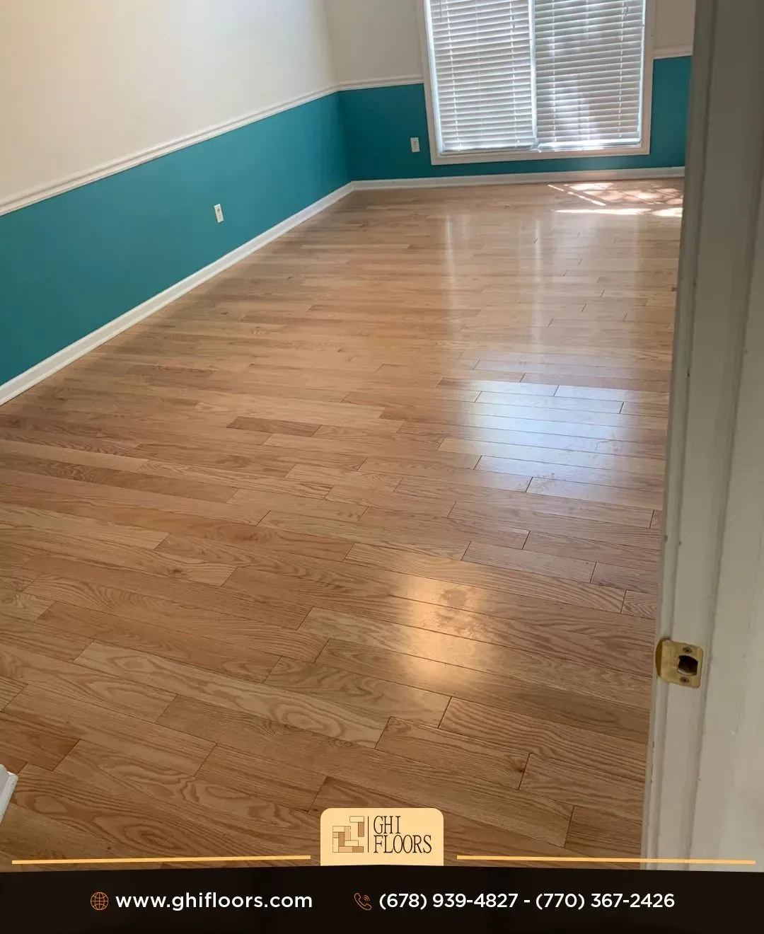 A room with hardwood floors and blue walls.