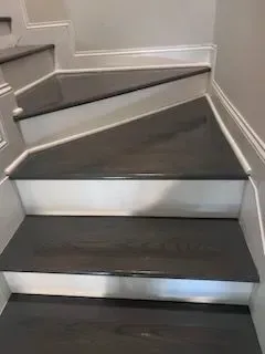 A close up of a set of stairs in a house.