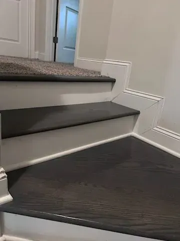 A close up of a set of stairs in a house.