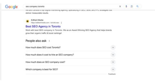 A blurred image of a google search for best seo agency in toronto.