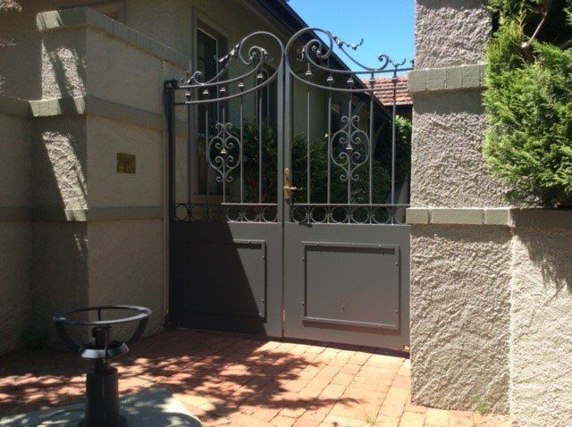 Gate with Decorative Design — Canberra, ACT — Capital Doorworks