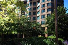 High rise building with vegetation outside
