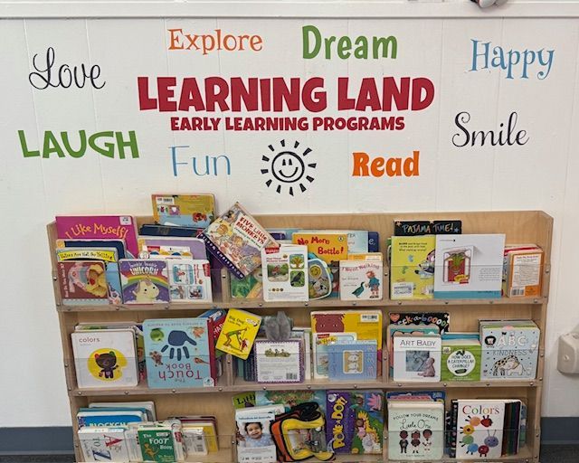 Family holding a sign that says