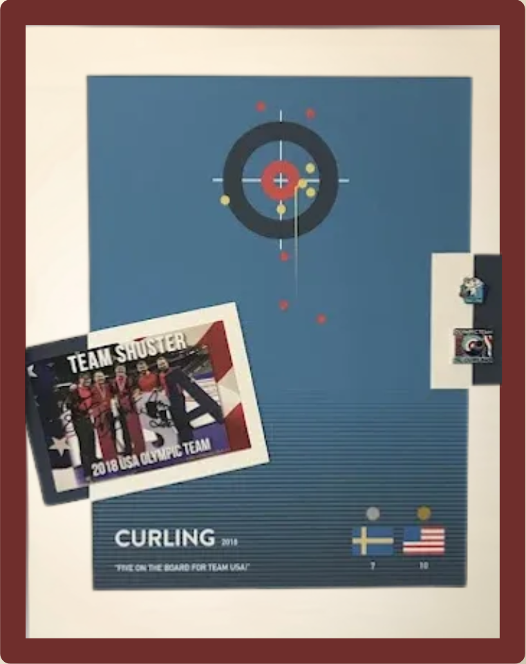 Framed curling art with a poster, flag, and a photo of a team in a red frame.