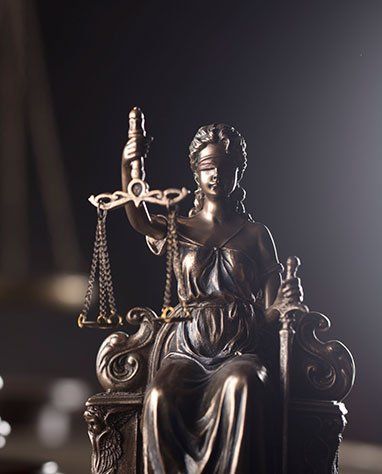 Lady Justice — Mineola, NY — Raymond Nardo, P.C