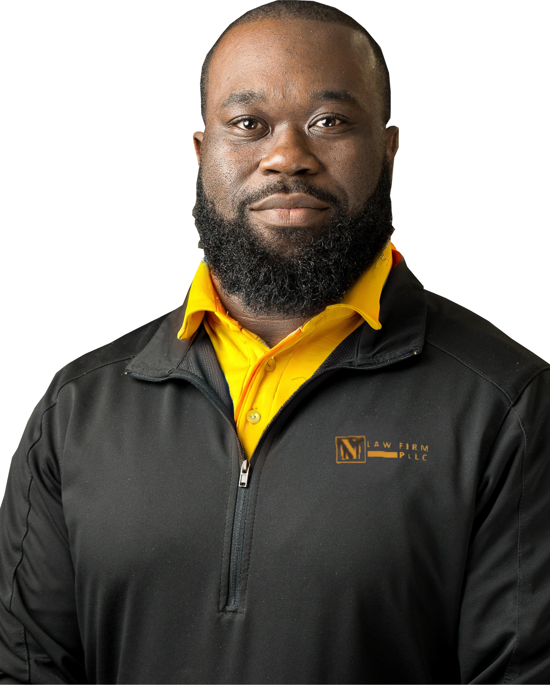 A man in a suit and tie is standing with his hands folded