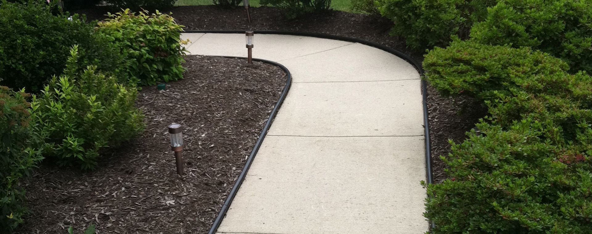 Curved Concrete Walkway — Columbus, NJ — G & G Landscaping Construction, Inc.