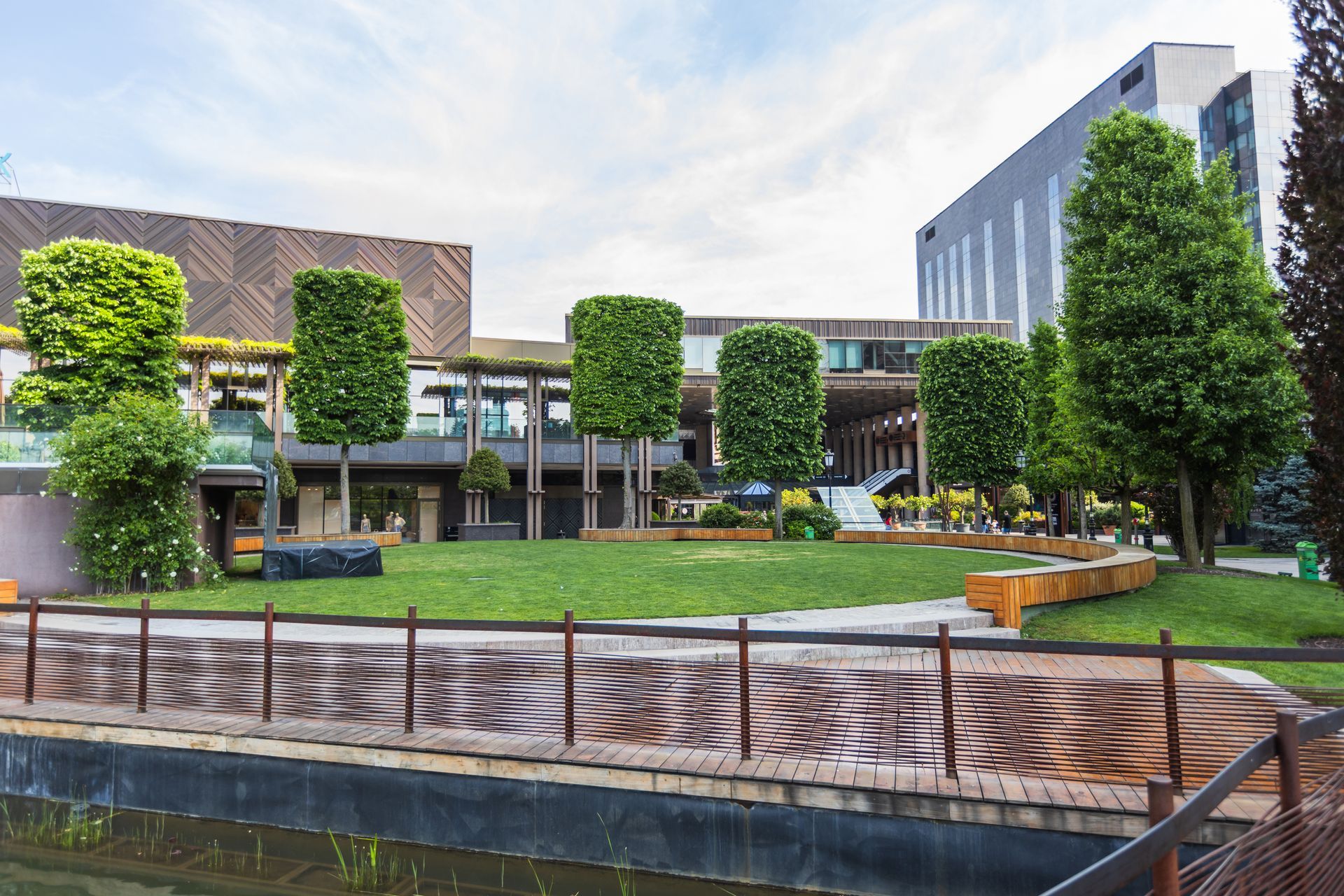 Modern business complex with landscaped greenery.