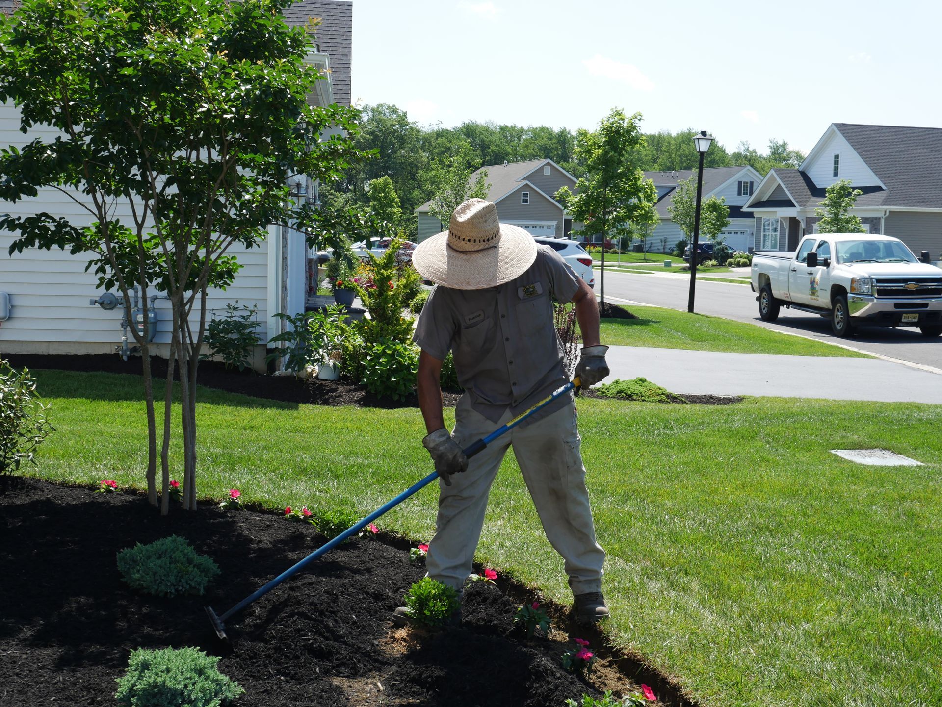 Man Is Cleaning The Garden — Columbus, NJ — G & G Landscaping Construction, Inc.