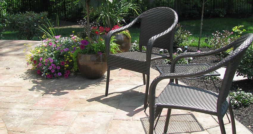 Two Chairs Are Sitting On A Patio — Columbus, NJ — G & G Landscaping Construction, Inc.