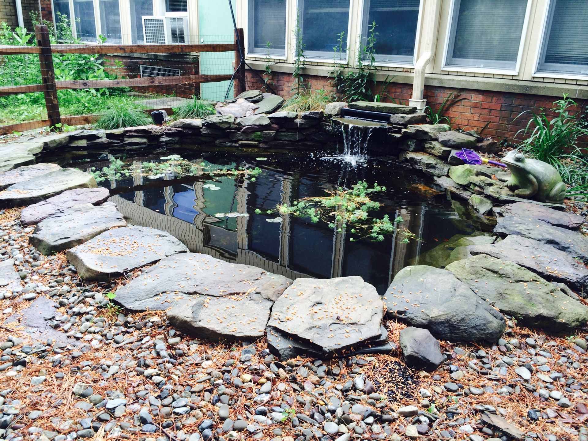 A Pond With Rocks — Columbus, NJ — G & G Landscaping Construction, Inc.