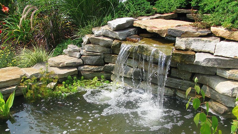 Waterfall In The Middle Of A Pond - Columbus, NJ – G & G Landscaping Construction, Inc. Waterfall In The Middle Of A Pond - Columbus, NJ – G & G Landscaping Construction, Inc.