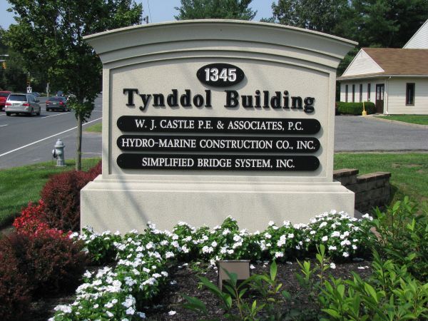 A Sign That Says Tynddol Building On It — Columbus, NJ — G & G Landscaping Construction, Inc.