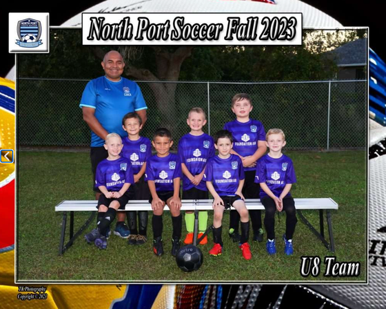 North Port Soccer Fall 2023 U8 team photo with coach on a bench, wearing purple uniforms
