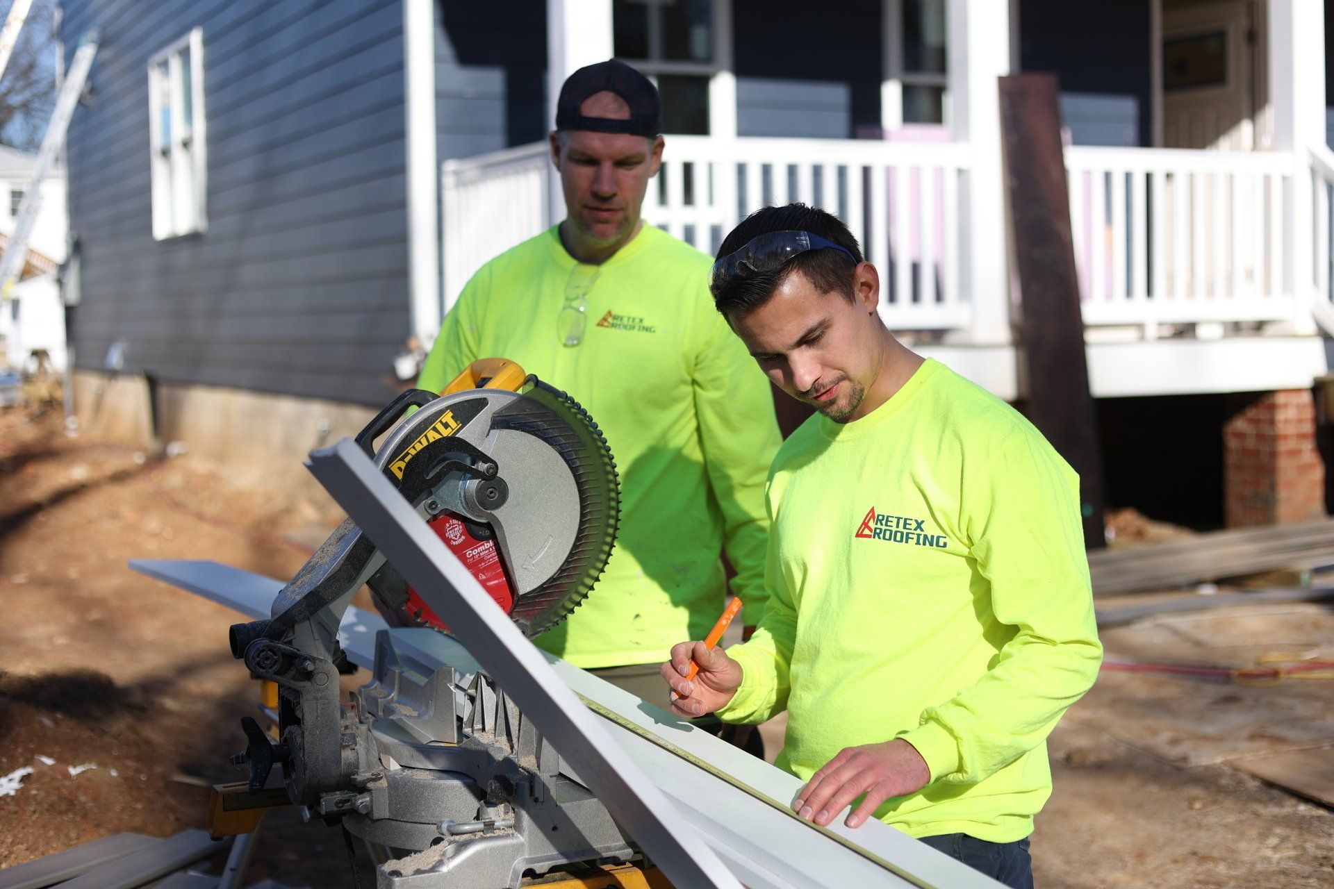 Image of RETEX's Caleb Kammerling and Mark Erickson volunteering for Richmond Habitat for Humanity.
