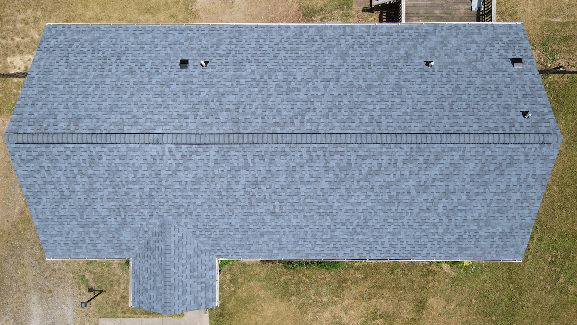 After image of a RETEX shingle roof replacement in Woodford VA 22580.