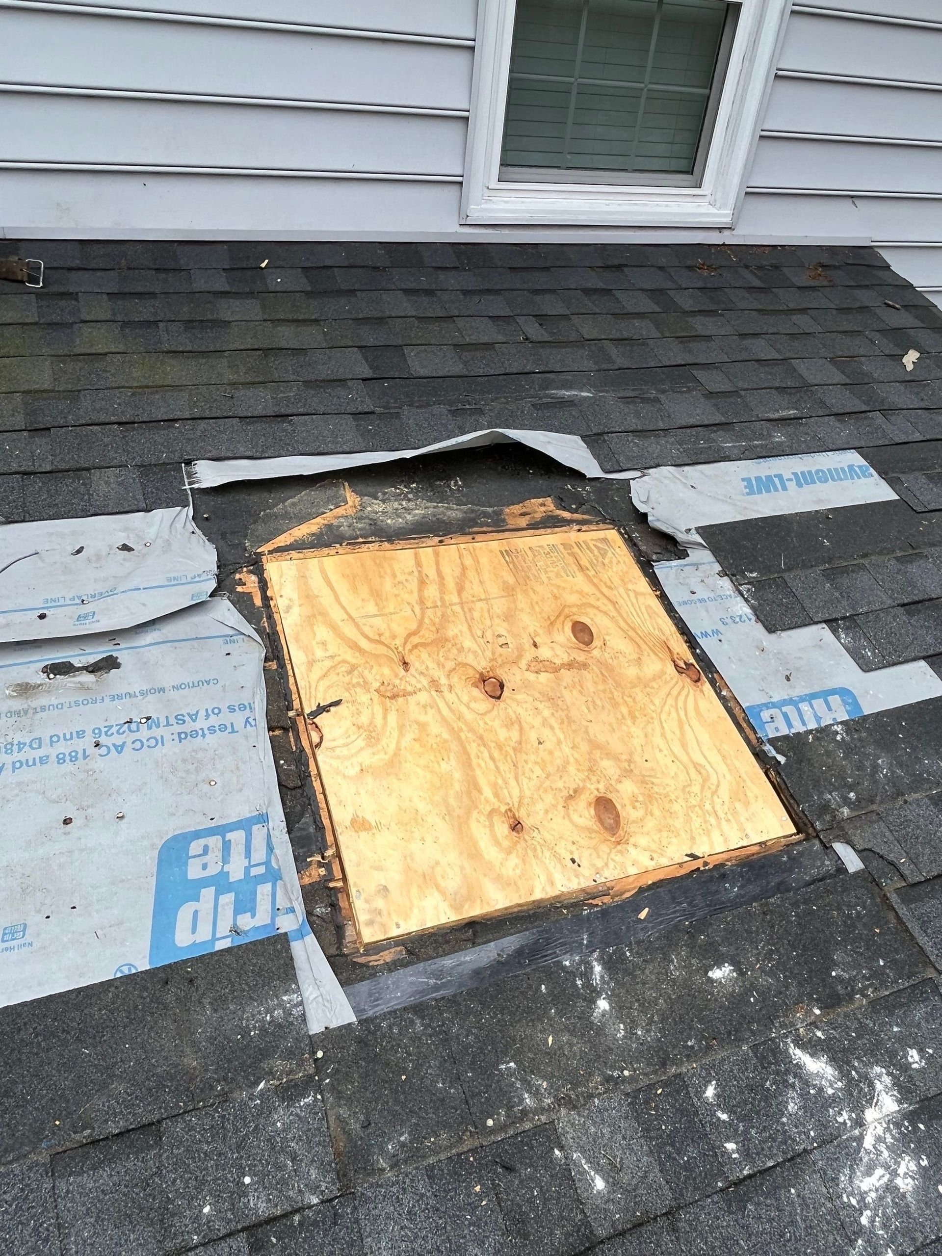 A during-project image of a RETEX skylight removal project in North Chesterfield VA 23236.