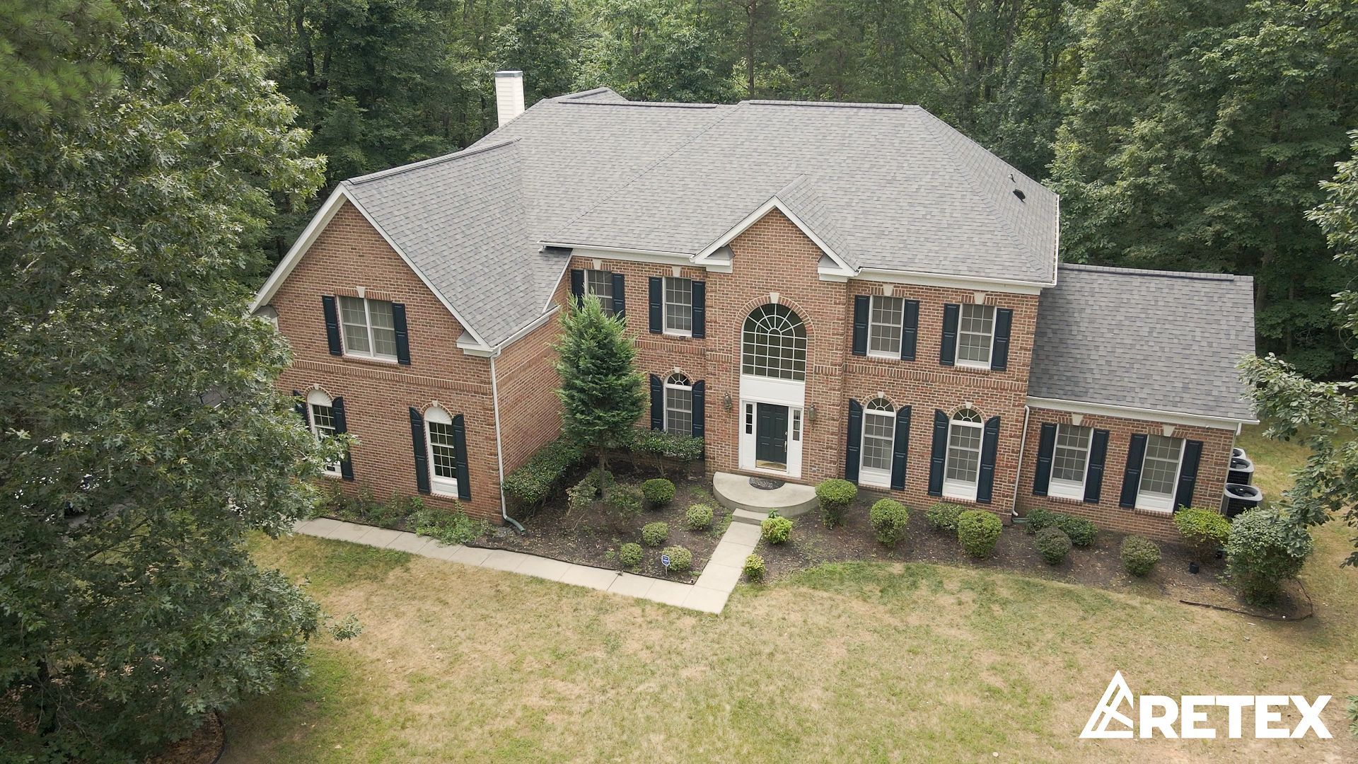 Retex replaced this Fredericksburg asphalt shingle roof in June 2024.
