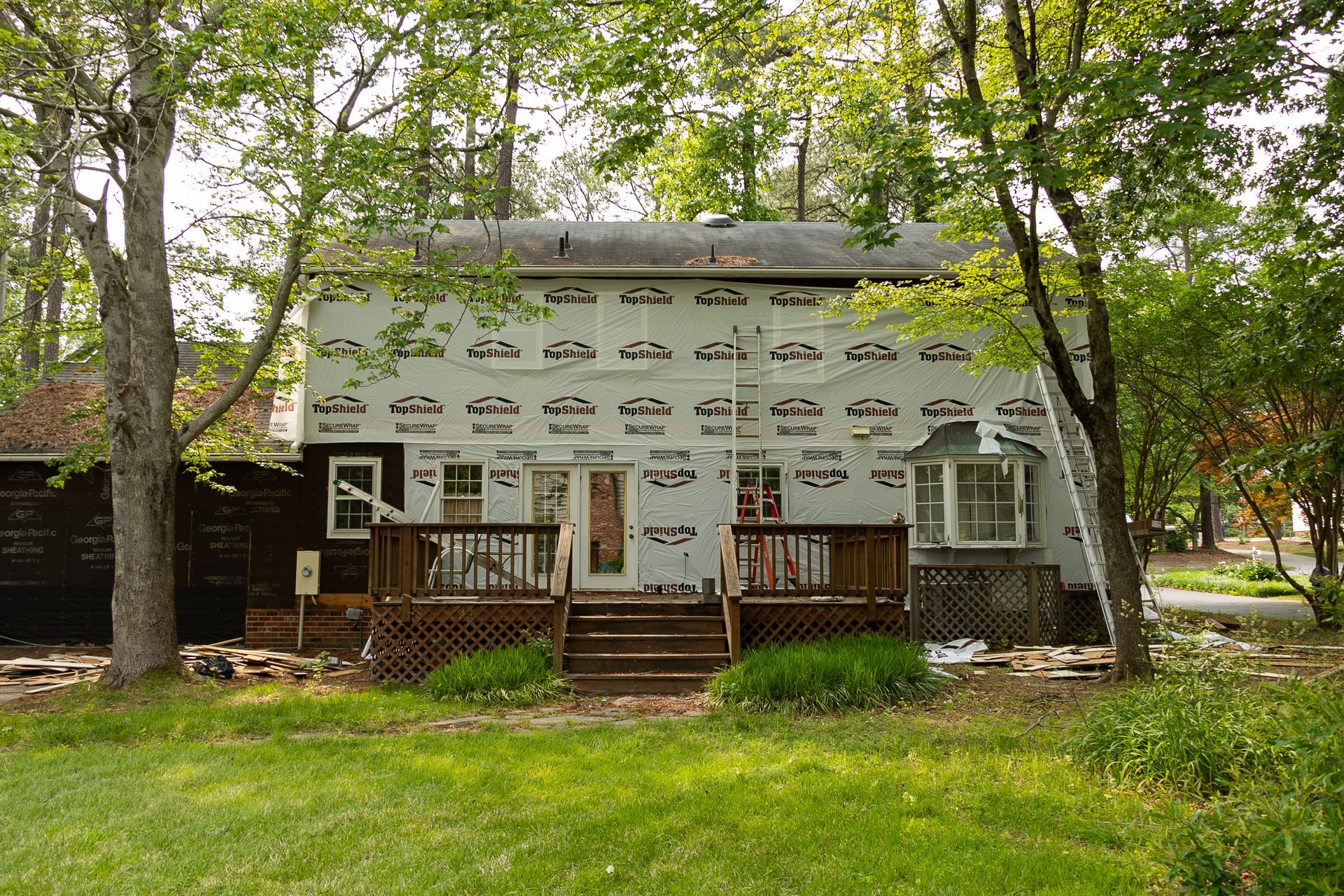 A during-installation image of RETEX siding installation in North Chesterfield VA 23235.