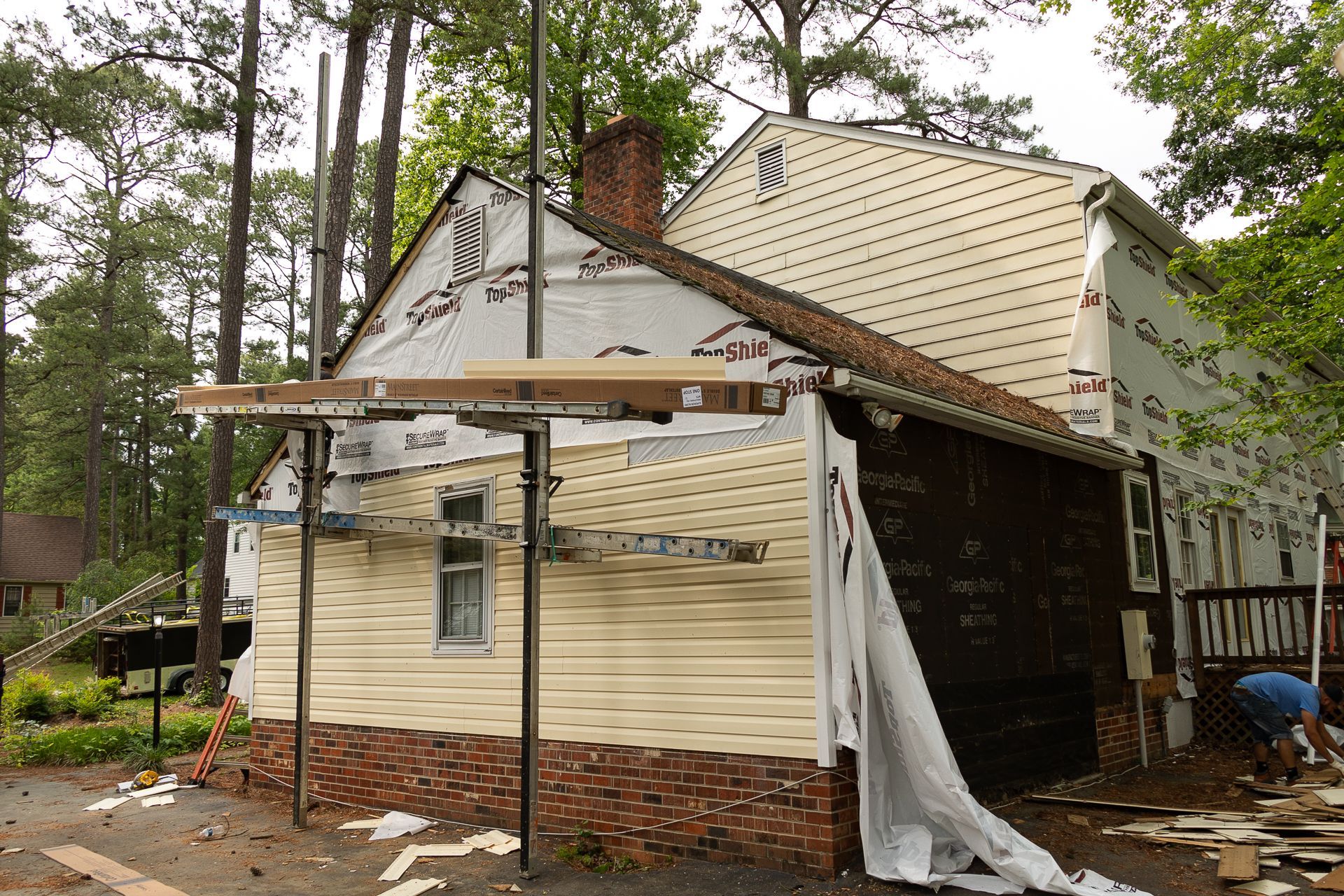 A during-installation image of RETEX siding installation in North Chesterfield VA 23235.