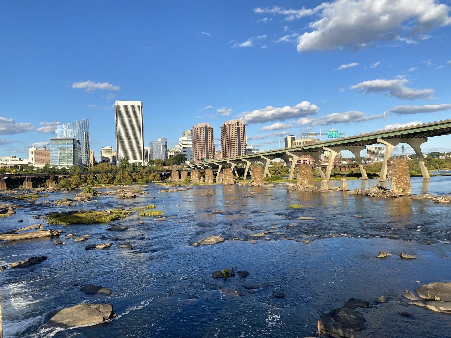 Image of the Richmond skyline and James River from Richmond's Folk Festival 2022. Captured by RETEX's Katelyn Lewis.
