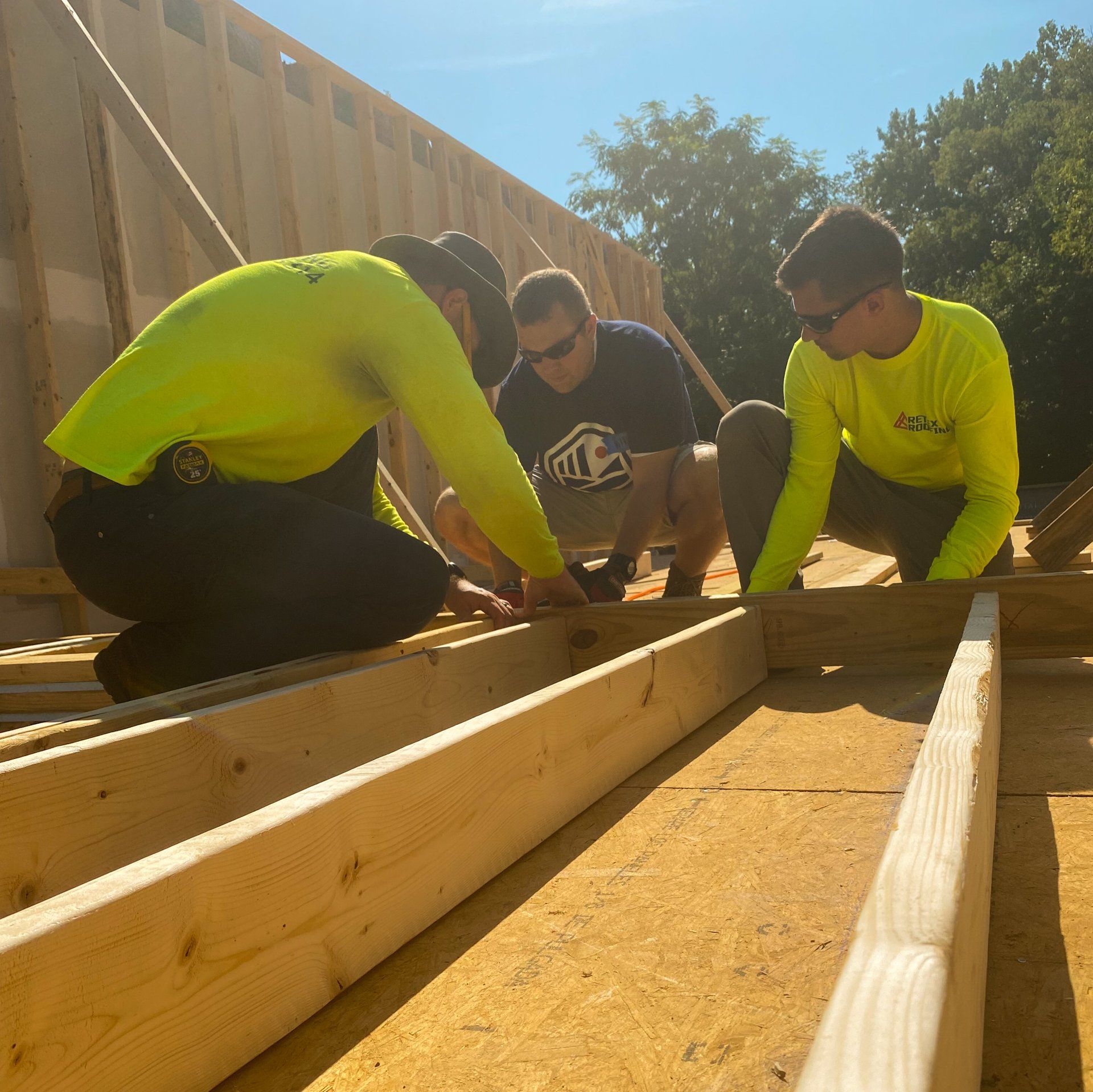 Image of RETEX's Josh Lewis and Caleb Kammerling building out framing for a Richmond Habitat for Humanity home.