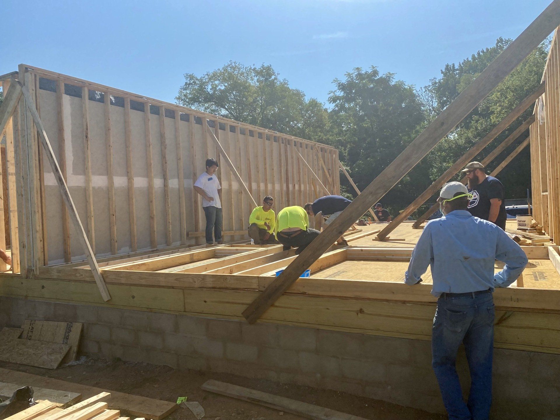 Image of RETEX team members building out framing for a Richmond Habitat for Humanity home.