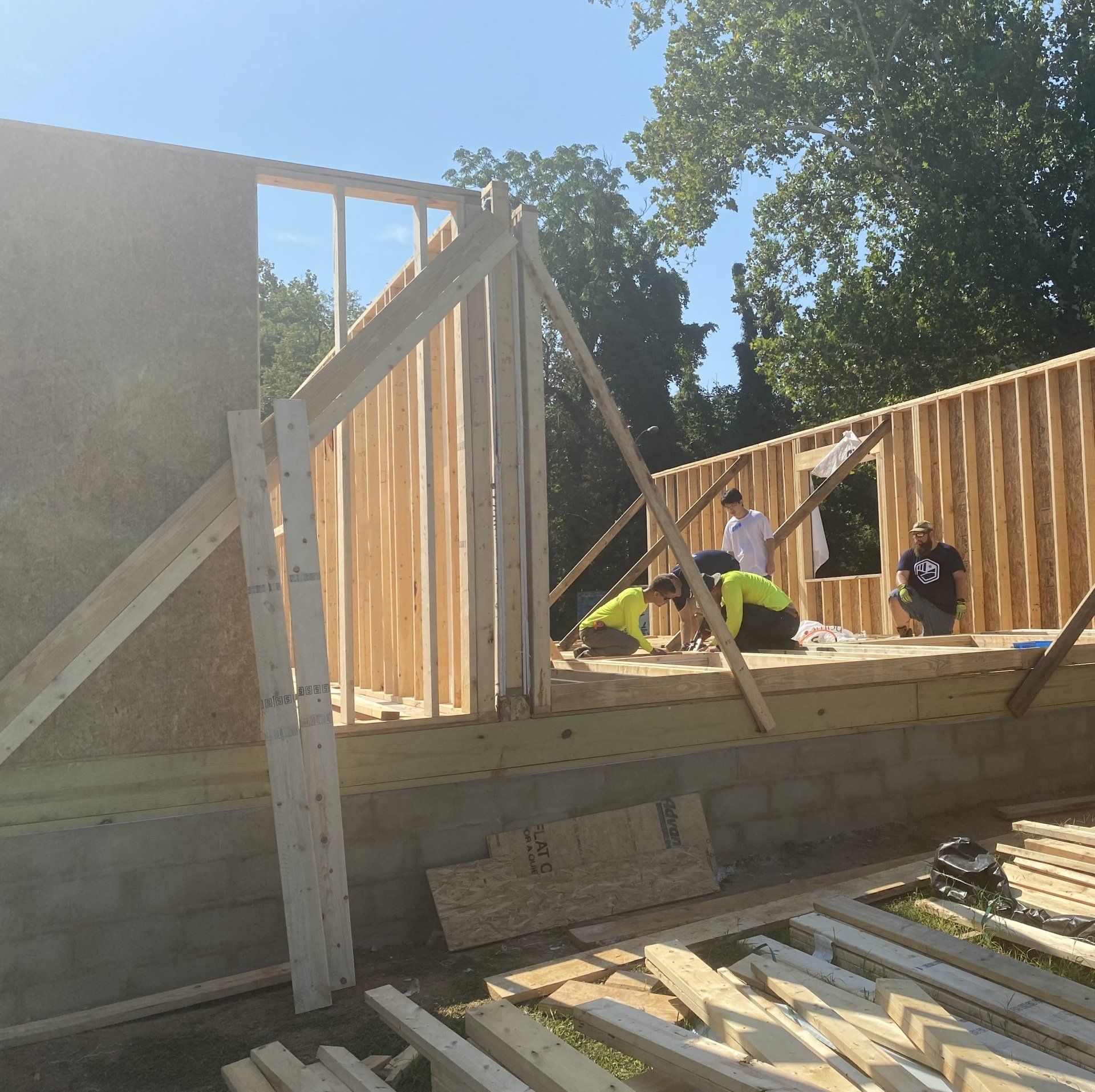 Image of RETEX team members building out framing for a Richmond Habitat for Humanity home.