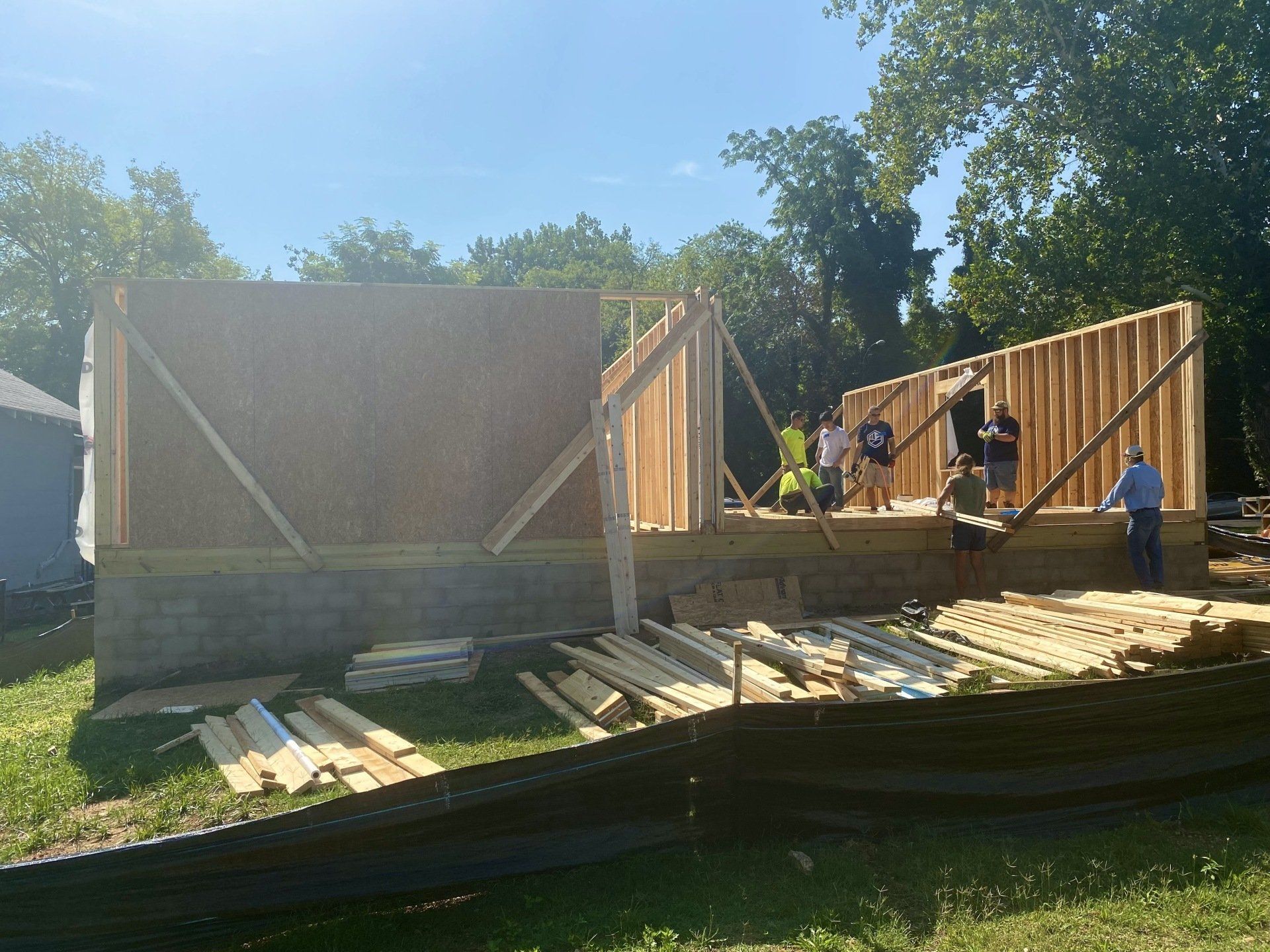 Image of RETEX team members building out framing for a Richmond Habitat for Humanity home.