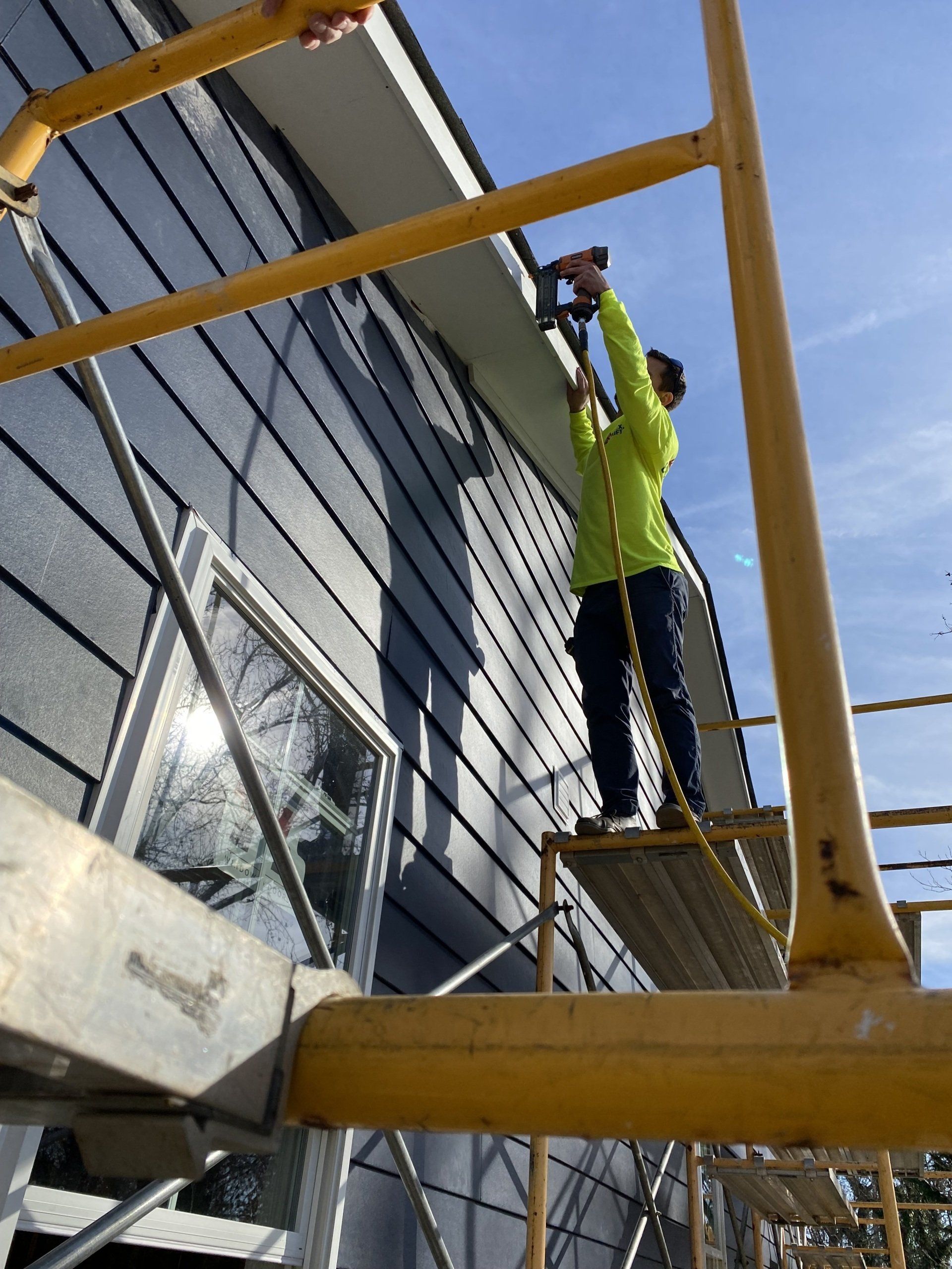 Image of RETEX’s Caleb Kammerling volunteering with Richmond Habitat for Humanity.