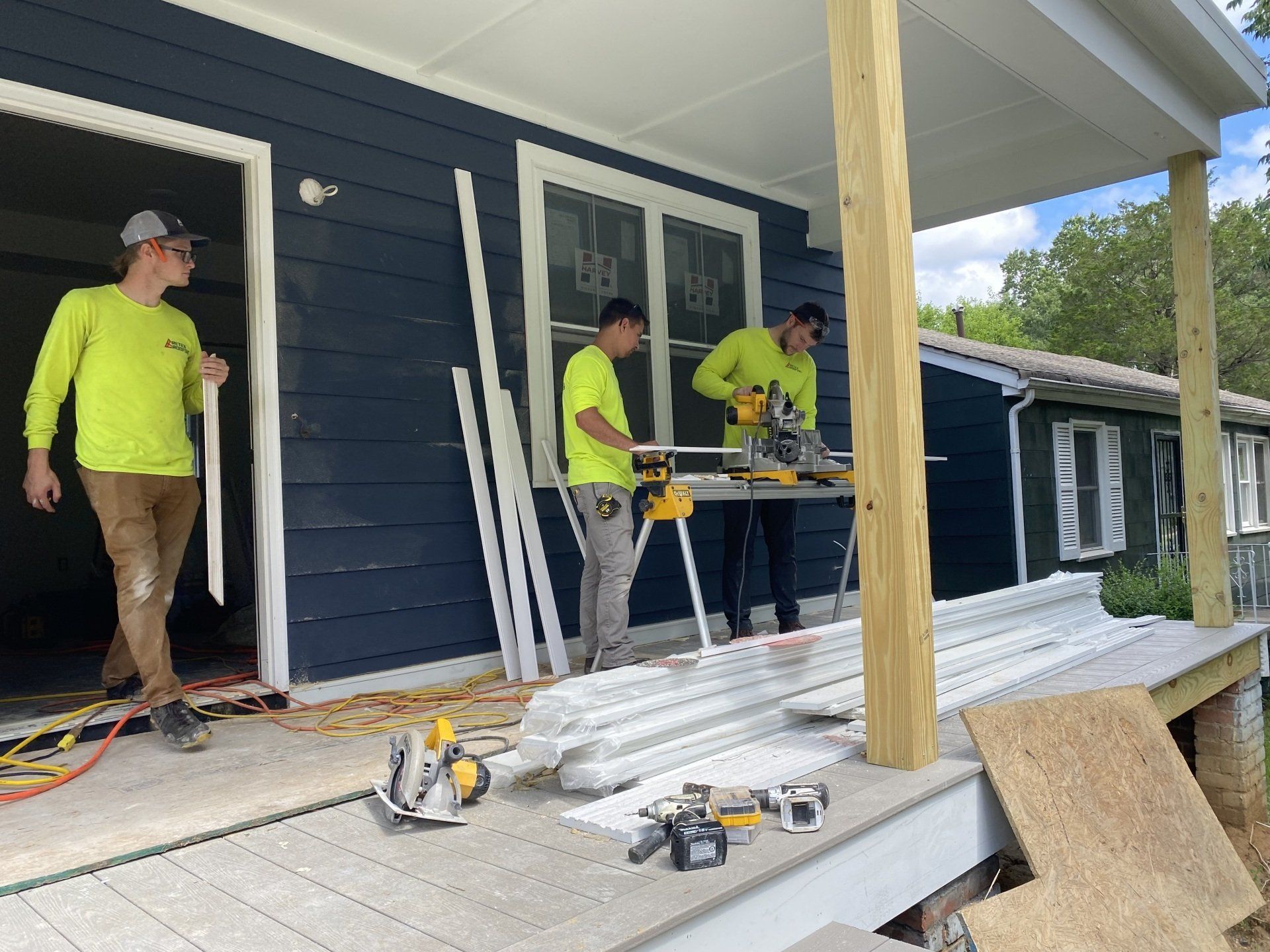 RETEX's Caleb Hennon, Caleb Kammerling, and Josh Lewis volunteering at RIchmond Habitat for Humanity in June 2022.