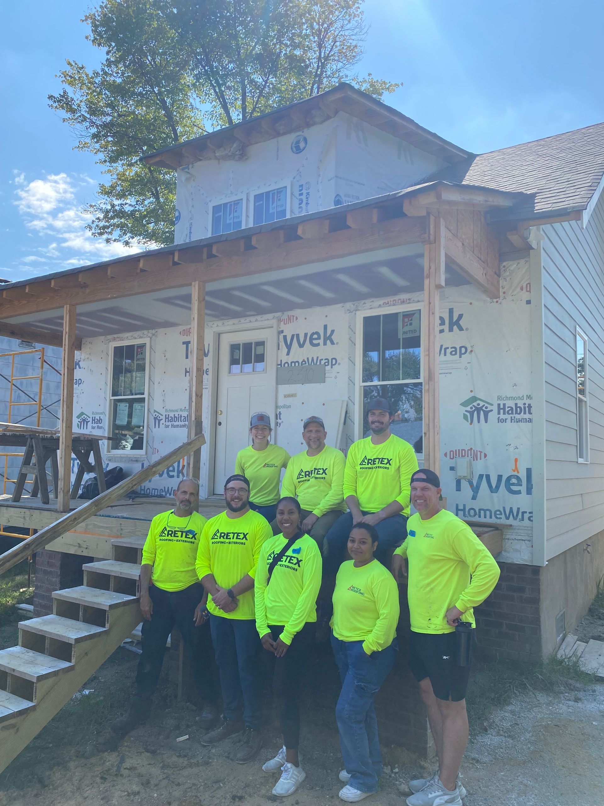 The whole Richmond RETEX team in front of a Richmond Habitat for Humanity home during our September 2024 volunteer day.