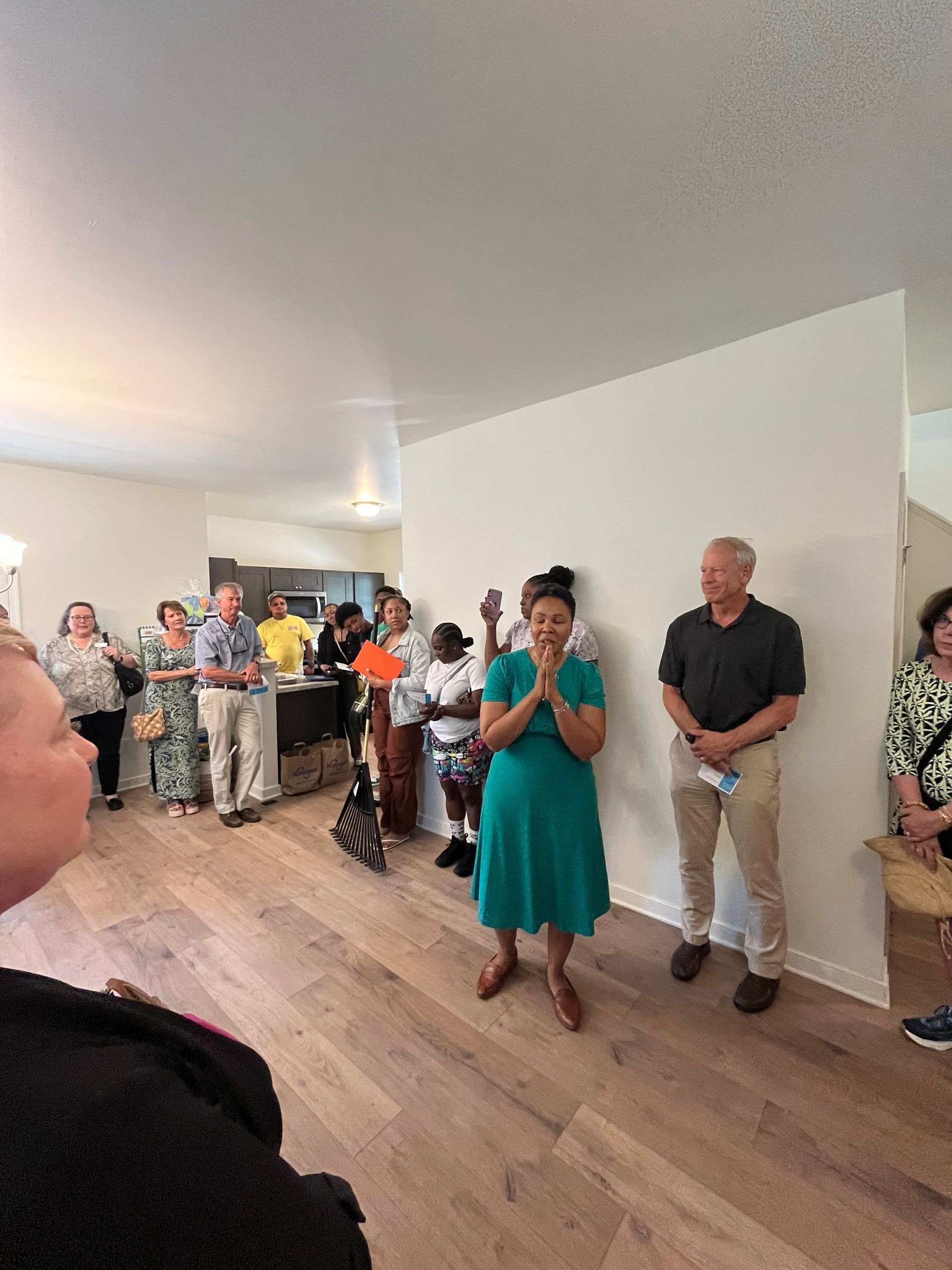 Image from Richmond Habitat for Humanity home dedication in May 2024.