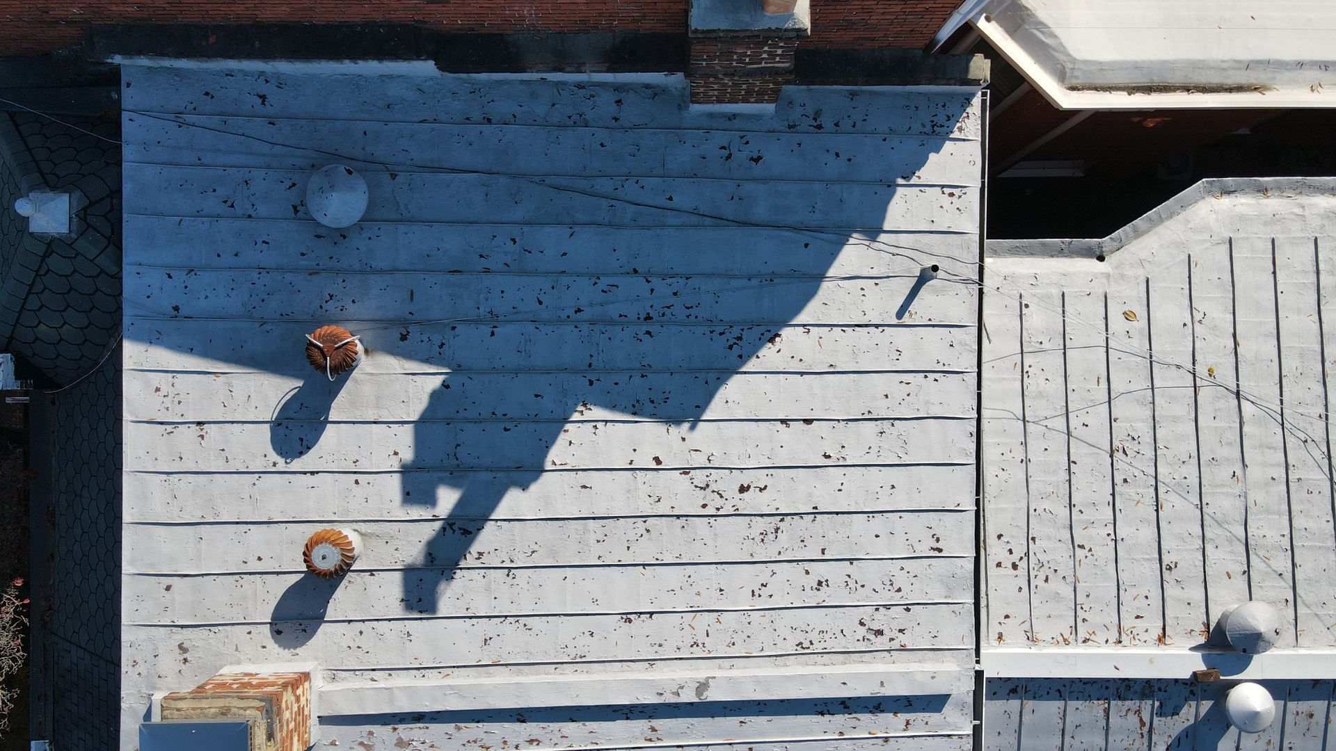 Drone image of a metal roof in need of recoating in Richmond VA 23220. Photo taken by RETEX's Caleb Kammerling.