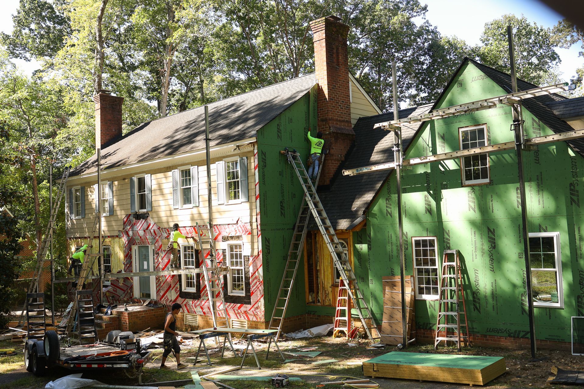 RETEX removes old siding and installs new sheathing on a home in the Salisbury neighborhood.